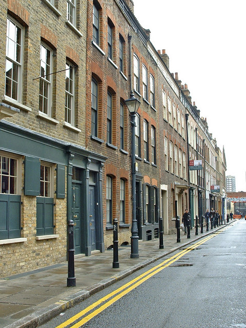 Georgian terrace houses on Fournier Street, Spitalfields, built by Huguenot silk weavers with glazed top-storey windows to light their looms